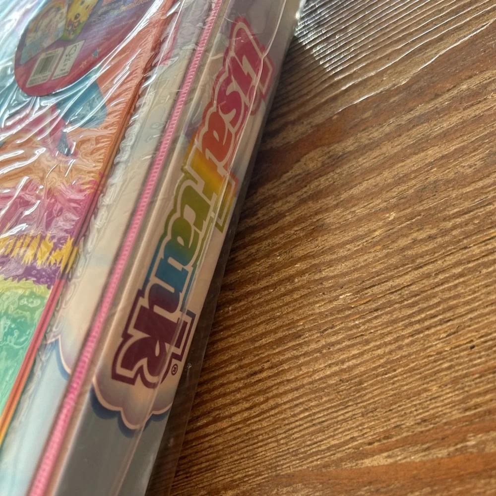 Lisa Frank notebook and binder set